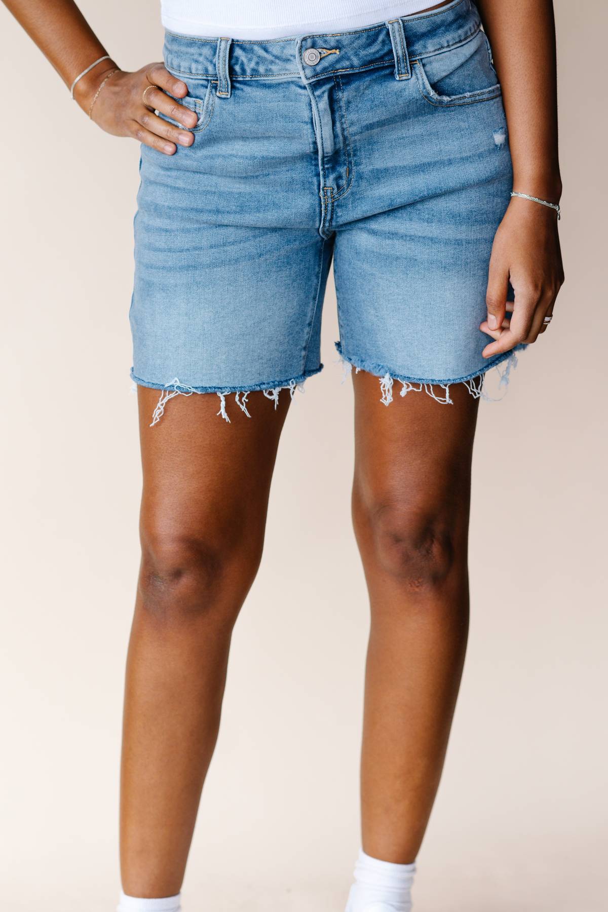 Mid Rise Raw Hem Denim Shorts